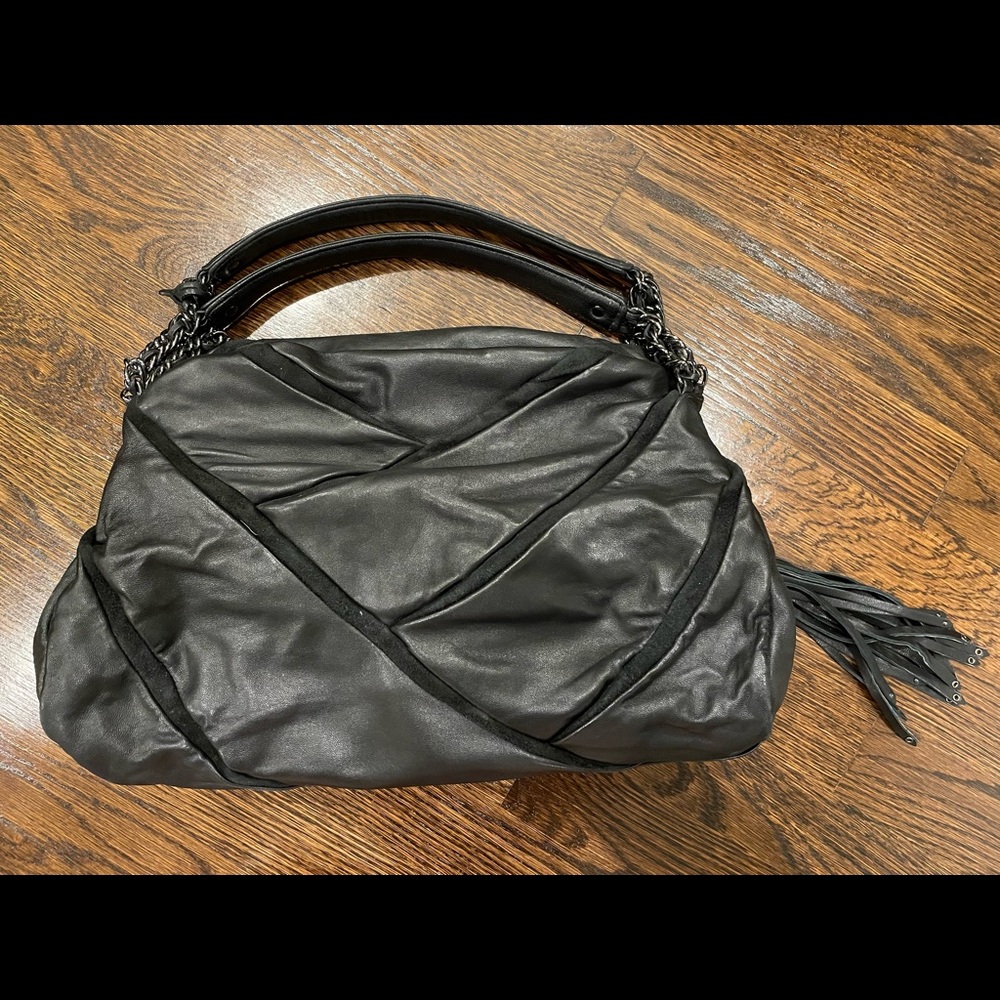 Maria Sharapova x Cole Haan black lambskin leather purse.